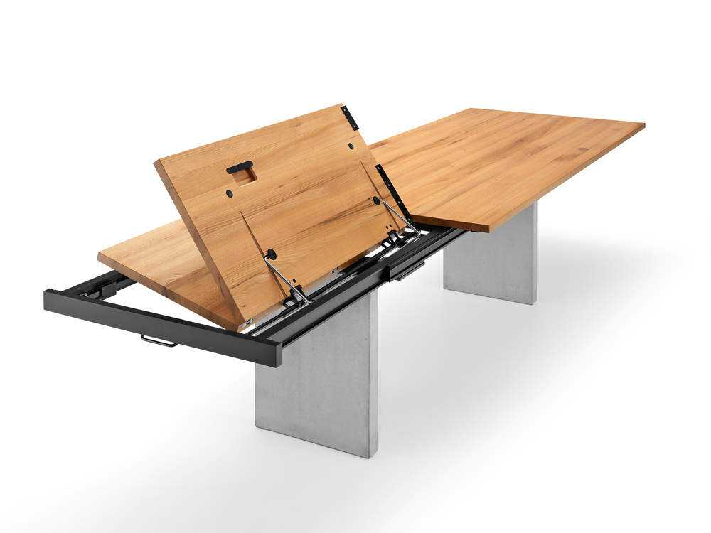 Girsberger Tisch BELA, Vergrößerung durch Einklappmechanismus mit versteckter Platte